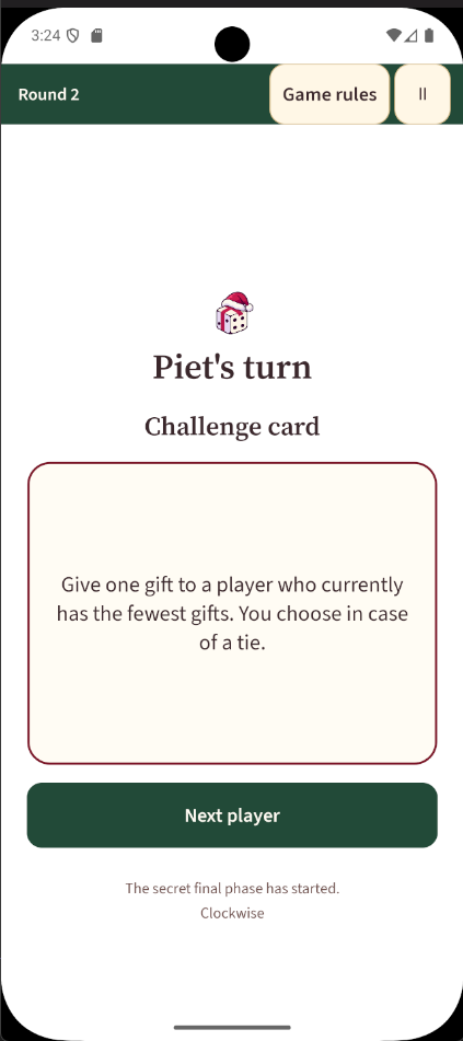 Actual CadeauChaos app screenshot showing a Christmas round-two assignment card in English.